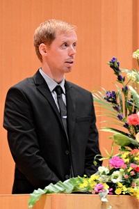 新大学院生代表 アスビョーン・イェンセンさんのスピーチの写真