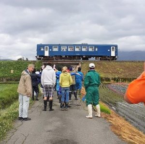 A train passes the field during the explanation