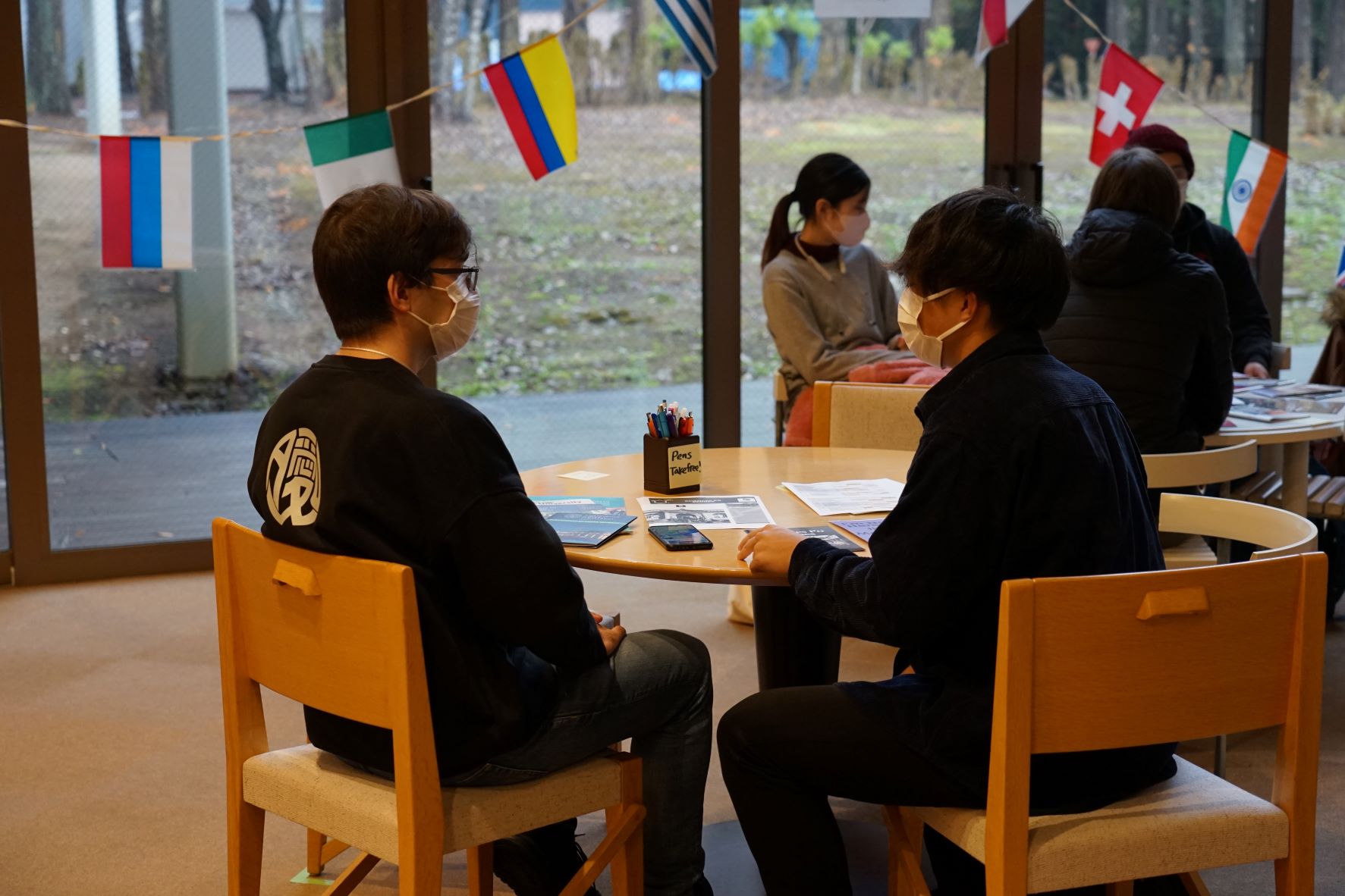 Photo of degree-seeking and international students conversing